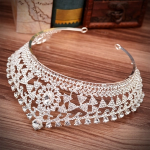 Elegant bridal crown with silver alloy and sparkling rhinestones on vintage background
