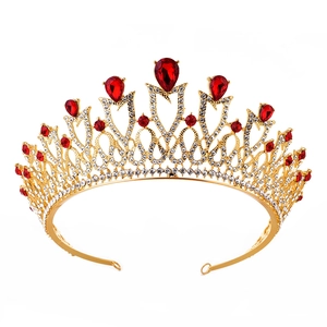 Detail of vintage bridal crown with red water diamonds and gold alloy plating