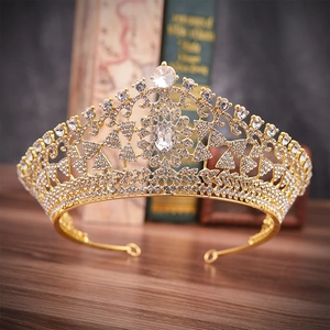 Exquisite gold bridal crown with sparkling white rhinestones in a geometric design
