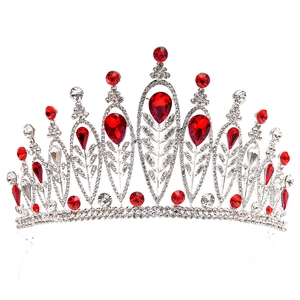 Detailed view of Baroque bridal crown with silver alloy leaves and red rhinestone droplets