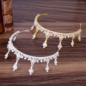 Elegant gold and silver bridal tiaras with white pearls and sparkling rhinestones