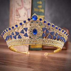 Exquisite gold bridal crown tiara with deep blue crystals and rhinestones in baroque style