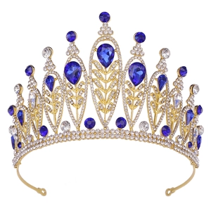 Baroque bridal crown with gold metal leaf texture and blue teardrop rhinestones