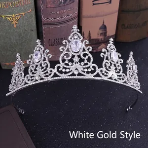 Elegant silver bridal crown with white crystals and sparkling stones in baroque style