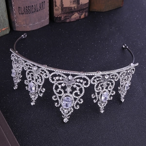 Detailed macro view of silver crystal tiara featuring sparkling baroque zircon stones