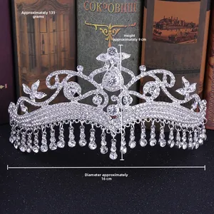 Detailed macro of silver bridal crown with sparkling rhinestones and dangling tassels