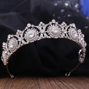Elegant silver rhinestone bridal crown with sparkling crystal embellishments for wedding events