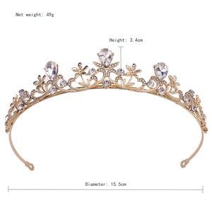 Plan détaillé de la couronne dorée indiquant 15,5 cm de diamètre et 3,4 cm de hauteur