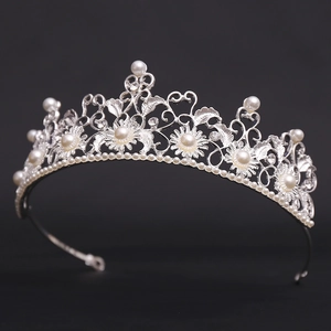 Detailed macro of vintage Baroque sunflower crown with pearls and rhinestones