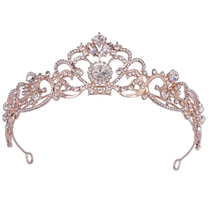 Elegant rose gold bridal tiara with sparkling crystal rhinestones and intricate floral patterns
