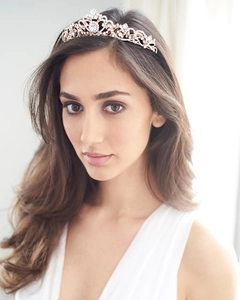 Close-up of rose gold bridal crown with crystal rhinestones on elegant model