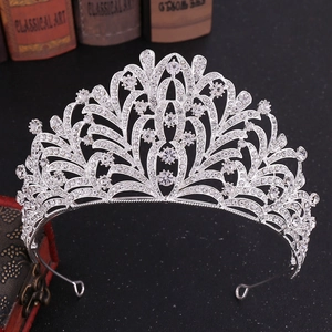 Elegant silver bridal tiara with leaf-shaped rhinestones and vintage classical props