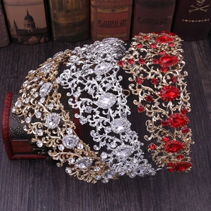 Close-up of Baroque crowns with intricate rhinestones and vintage hollow patterns