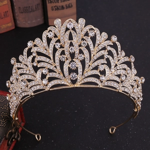 Elegant gold leaf bridal crown with sparkling rhinestones and vintage hollow design