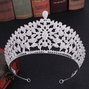 Exquisite silver bridal crown with intricate rhinestone patterns for beauty pageants