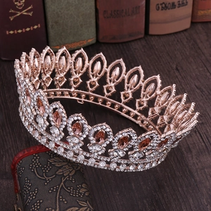Detailed close-up of champagne crystal baroque crown with rose gold finish for weddings