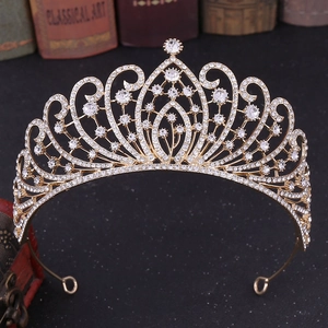 Macro detail of luxury baroque gold tiara with sparkling crystal rhinestones