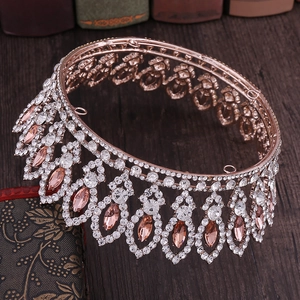 Detail of champagne marquise crystals and rose gold metal on baroque bridal crown