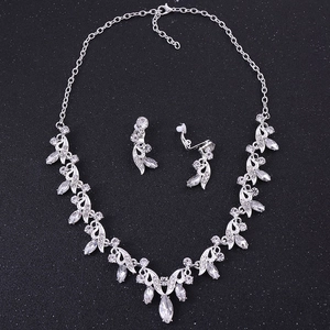Elegant crystal bridal jewelry set with floral silver alloy necklace and matching earrings