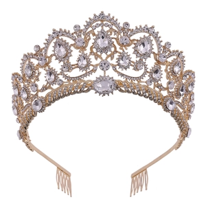 Detailed close-up of crystal bridal crown featuring teardrop rhinestones and gold comb