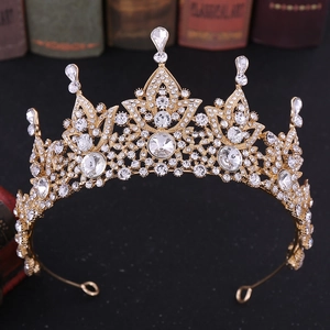 Detailed close-up of European baroque bridal crown featuring crystals and vintage patterns