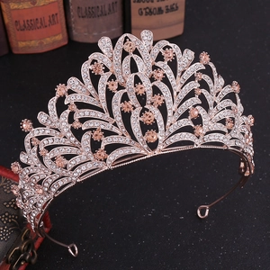 Luxury rose gold leaf crown with champagne crystals and diamonds for bridal hair styling