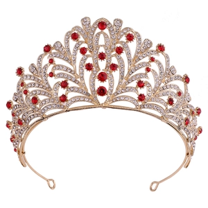 Baroque bridal crown with red rhinestones and gold leaf alloy vines on a white background