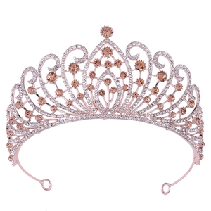 Close-up of luxury Baroque bridal crown with champagne crystals and rose gold metalwork
