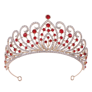 Luxurious baroque bridal tiara in gold finish with red crystals and clear rhinestones