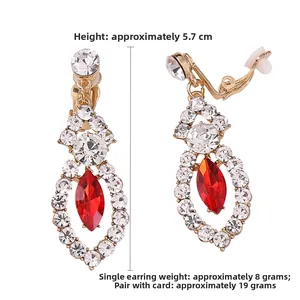Detail view of red marquise crystal earrings with a 5.7cm height measurement scale