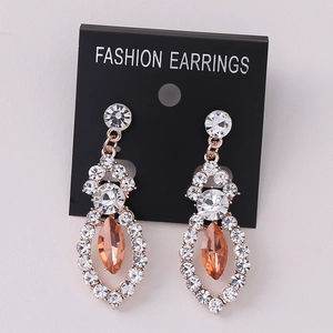 Elegant rose gold earrings with white rhinestones and champagne marquise center stone