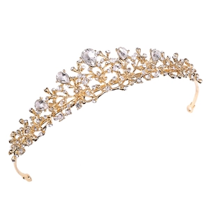 Golden bridal crown with crystal flower motifs and pear-shaped rhinestones on white background