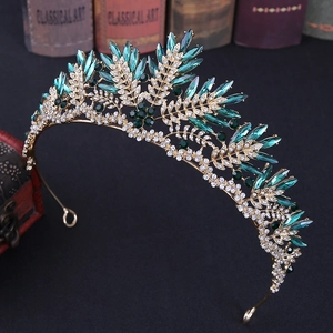 Baroque golden bridal crown with emerald green crystals and sparkling rhinestones