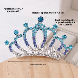 Close-up of silver crown hair comb with blue rhinestones showing 7.1cm width and 4.1cm height