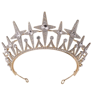 Detailed macro view of the gold bridal crown featuring crystal stars and zircon settings