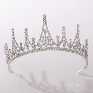 Close-up of sparkling silver wedding crown with intricate marquise cut crystals