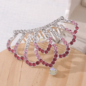 Detail of silver alloy tiara comb with gradient pink rhinestones for girls
