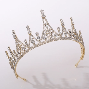 Close-up of golden baroque bridal crown featuring brilliant rhinestones and marquise zircons