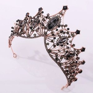 Macro detail of Baroque crown with rose gold metal and black rhinestones for weddings