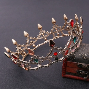 Close-up of vintage baroque bridal crown with luxury colorful crystals and filigree work