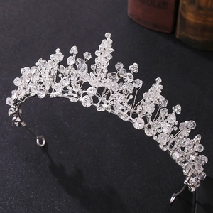 Exquisite bridal tiara crown with silver rhinestones and crystal beads for wedding wear
