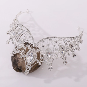 Detail of silver alloy crown with sparkling rhinestones and marquise crystals