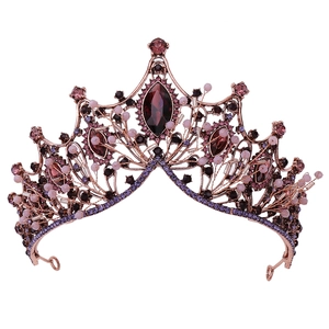 Ornate baroque bridal crown with deep purple crystals and vintage bronze metal frame