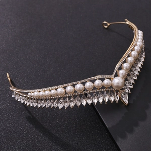 Elegant gold bridal tiara with ivory pearls and marquise cut crystal pendants