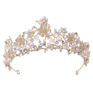 Elegant bridal crown with gold metal frame, white pearls and sparkling crystal flowers