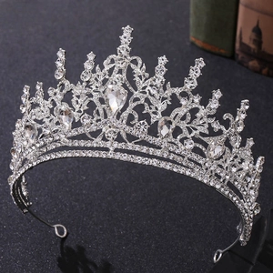 Baroque silver bridal crown featuring sparkling crystals and large pear-shaped rhinestones