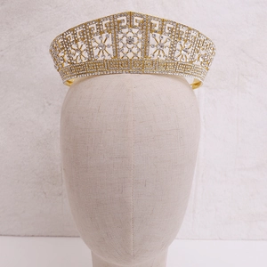 Macro view of detailed gold zinc alloy bridal tiara with sparkling crystal rhinestones