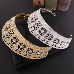 Elegant baroque bridal crown set with sparkling rhinestones in gold and silver finish