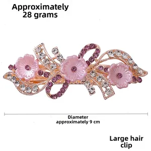 Detail der 9cm rosa Kristall Blume Haarspange mit Roségold-Finish und 28g Gewicht