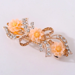 Detailansicht der eleganten Kristall-Blumen-Haarklammer mit goldenem Metallsockel